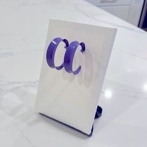 Purple hoop shaped earrings